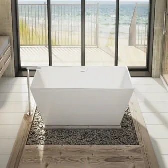 White soaking tub sits in a bathroom