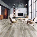 A remodeled living room with luxury vinyl flooring
