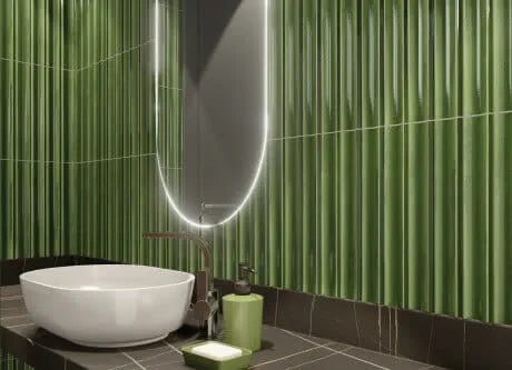 Green wall tile in a bathroom