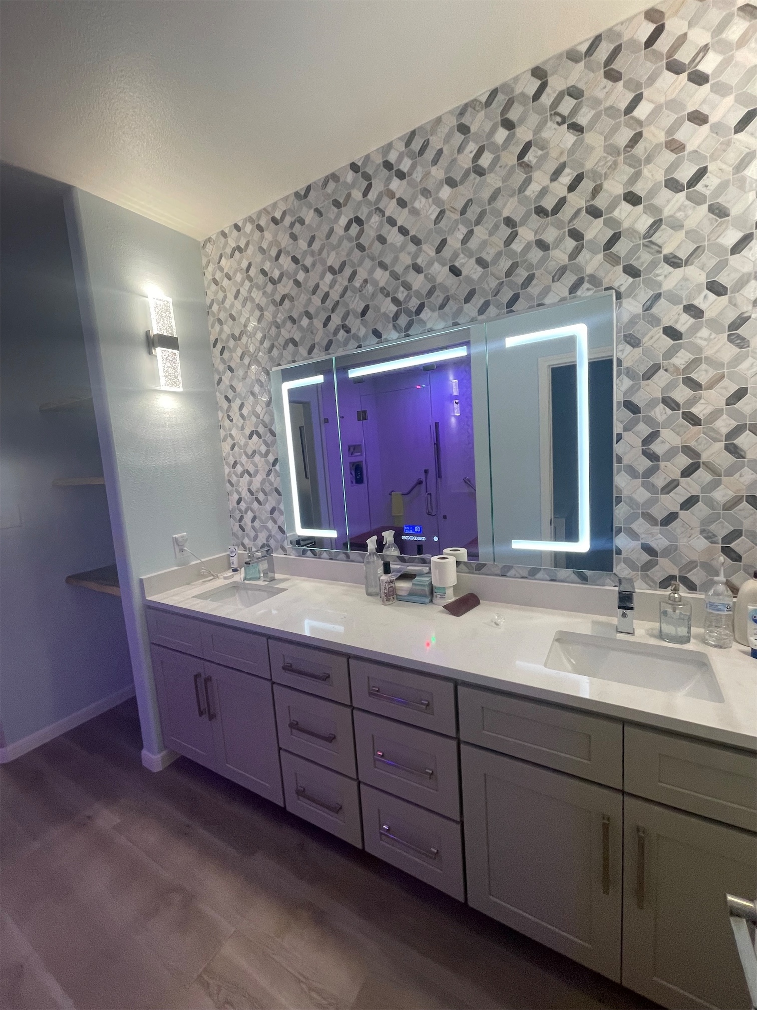 Lighted mirror in a remodeled bathroom