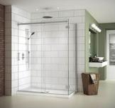 A shower with tile flooring inside a remodeled bathroom