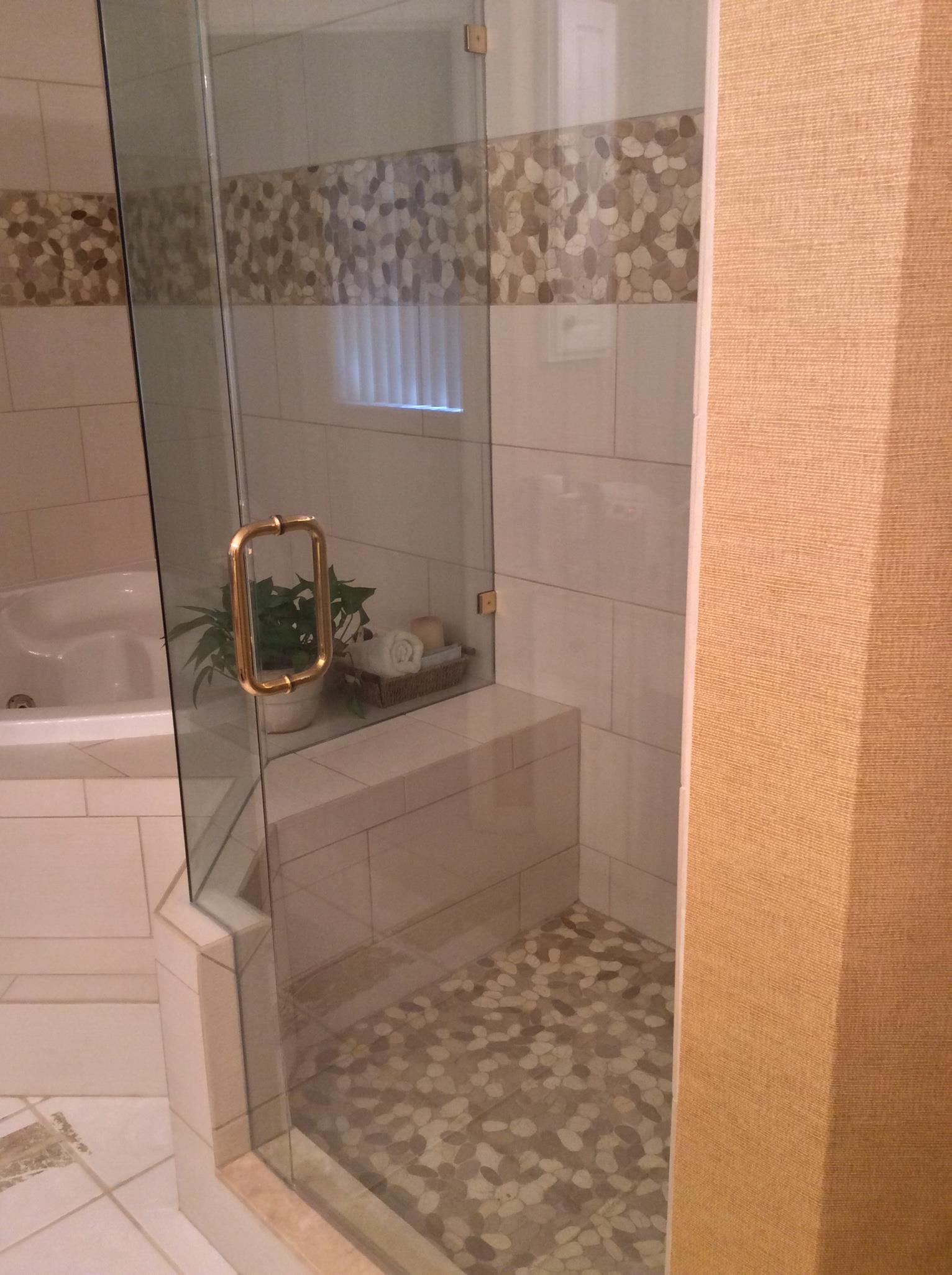 Bathroom with Pebbled Tile Accents After 2