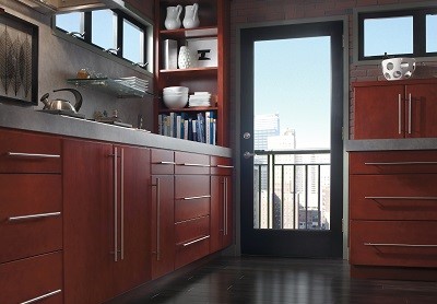 Aristokraft Cabinetry in dark wood finish available at ProSource Wholesale