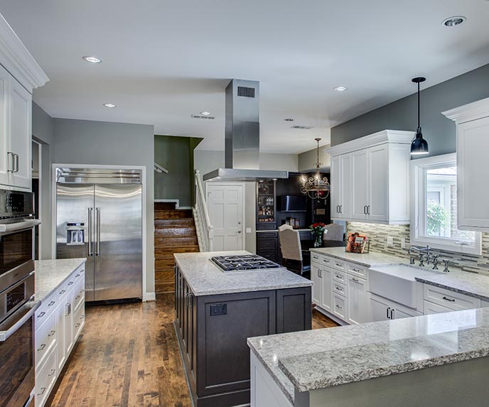 Transitional kitchen with modern ceiling mount downdraft 
