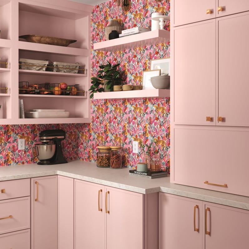 A closer look at pink painted cabinetry in a butler's pantry