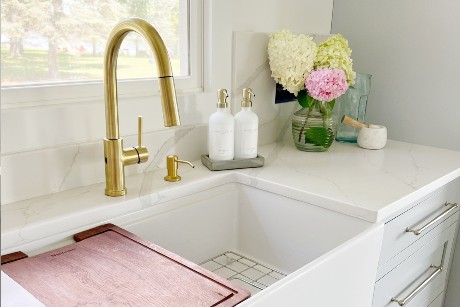 Nantucket sink with gold faucet available at ProSource Wholesale