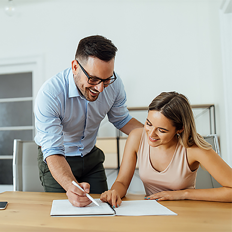 A couple creating a list of needs for their home remodel from the comforts of their home.