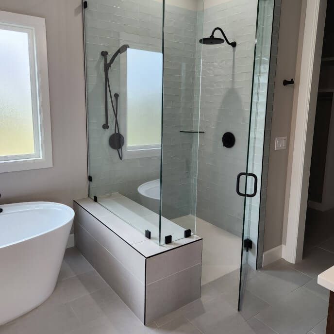 Long, white tiles in a bathroom shower