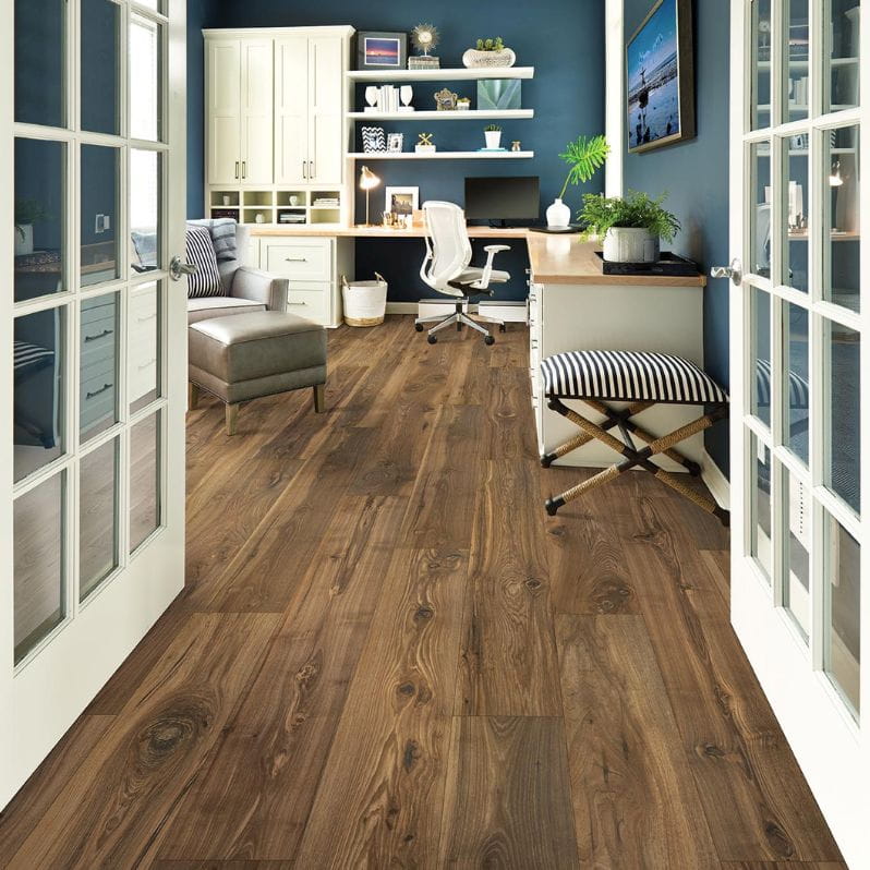Laminate Mohawk RevWood Premier Morena Bluffs in the Cliffside Pecan color flooring in a home office