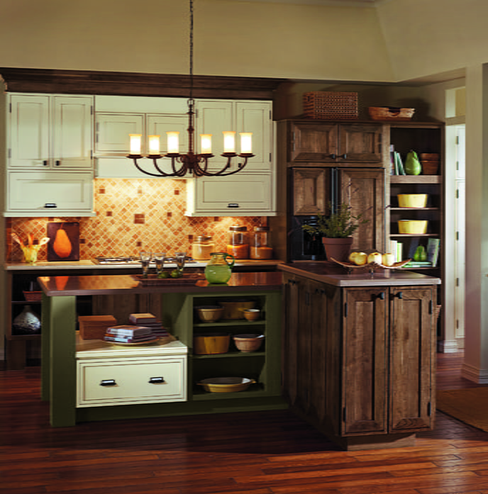 Three toned kitchen cabinetry showcased in remodeled kitchen