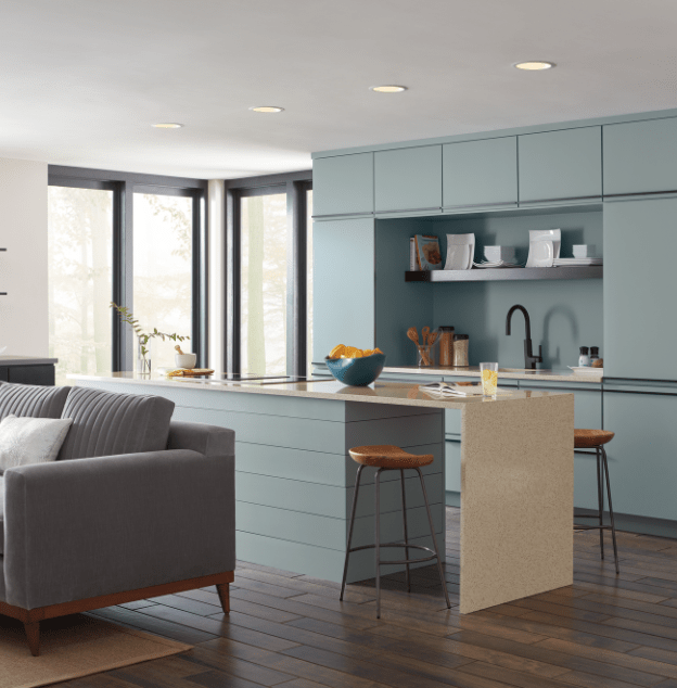 A clean and contemporary kitchen with sleek modern Decora cabinetry from MasterBrand. 