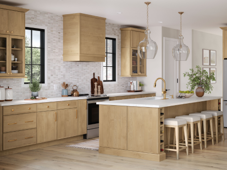 A spacious kitchen featuring natural wood cabinetry, a large island with bar seating, pendant lights, and a mix of modern and rustic decor. The room includes open shelving, light mosaic tile backsplash, and black-framed windows.