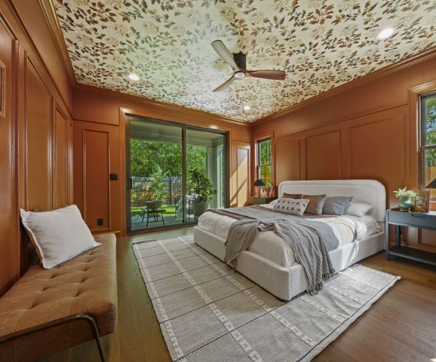 Rustic meets elegant in this custom master bedroom featuring factory direct flooring
