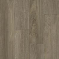 Smoky Quartz vinyl plank flooring with a soft gray color and gentle stone-inspired visual texture.