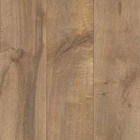 RevWood Honey tone Oak laminate flooring featuring warm honey-colored oak tones and visible straight-grain pattern.