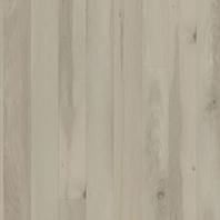 Close-up image of vinyl plank flooring with natural wood-like appearance.