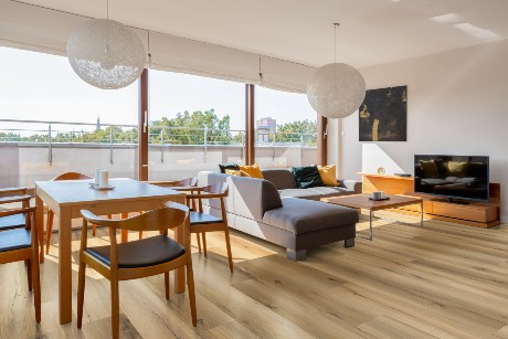 Room scene with TRUCOR Luxury Vinyl Plank available at ProSource Wholesale