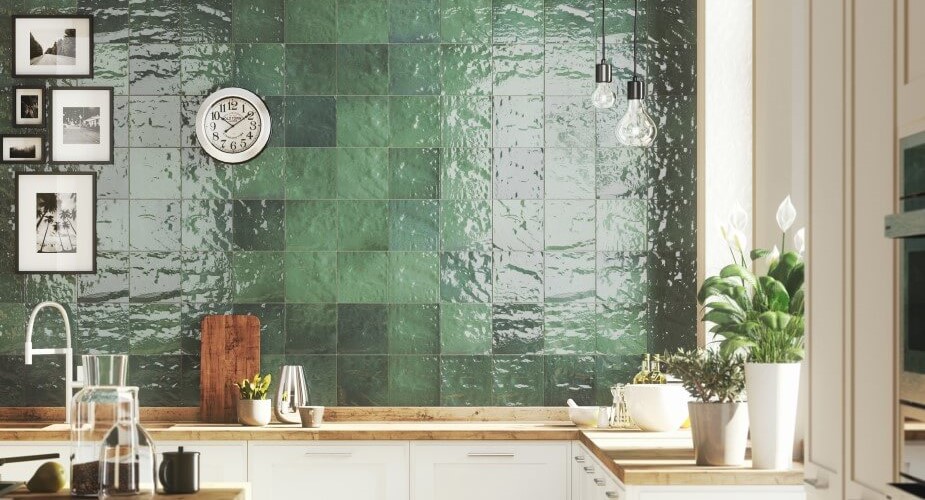 Green square tile on a kitchen wall