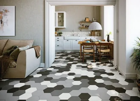 Unique tiling, such as dramatic patterns or unexpected layouts, is a 2024 home remodeling trend, achievable through ProSource Wholesale