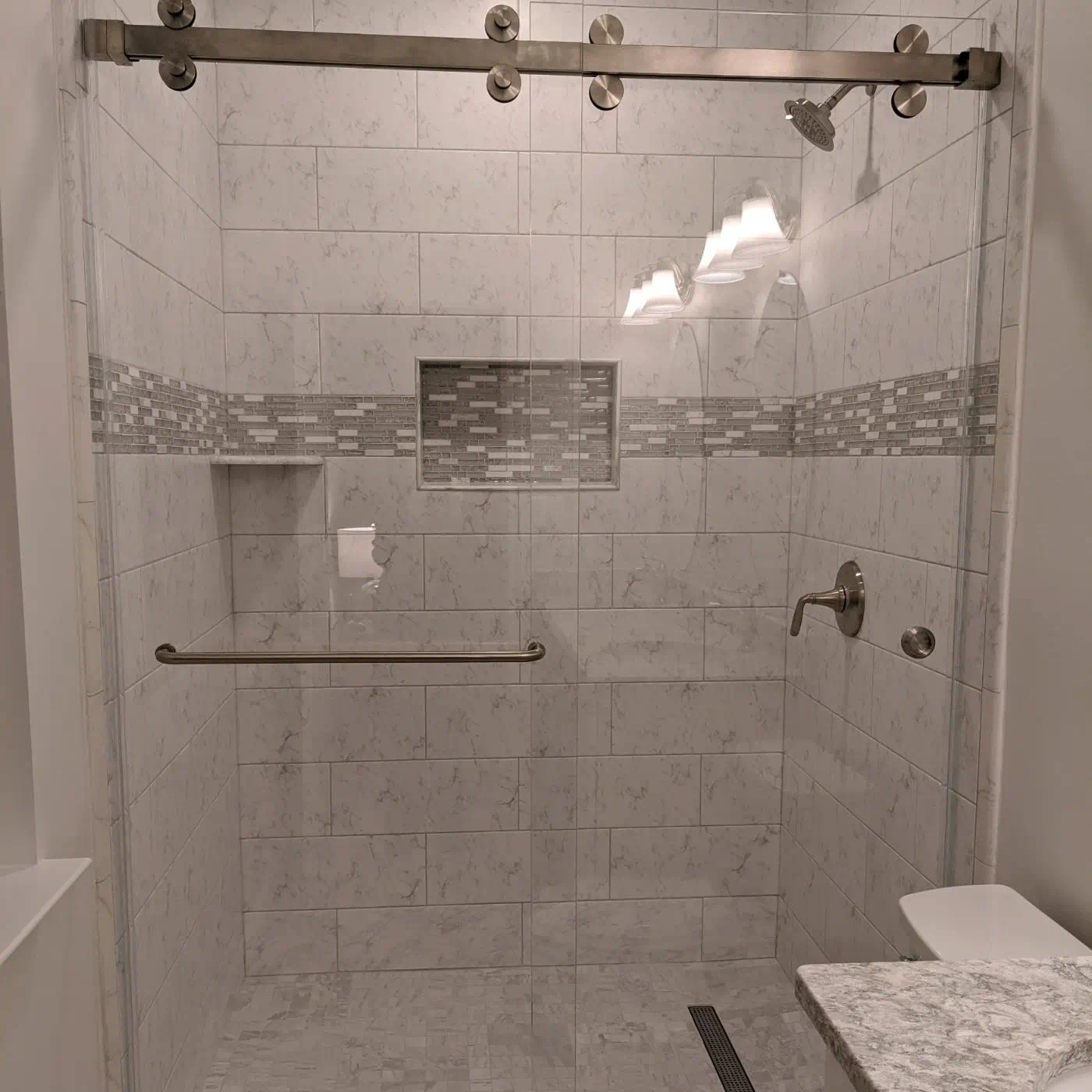 An image of a shower project in a bathroom completed by ProSource of Dulles
