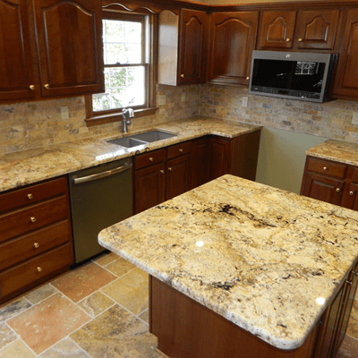 Dark wood cabinet kitchen with quartz countertops Louisville KY