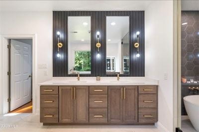 Master bathroom vanity with lighted mirror