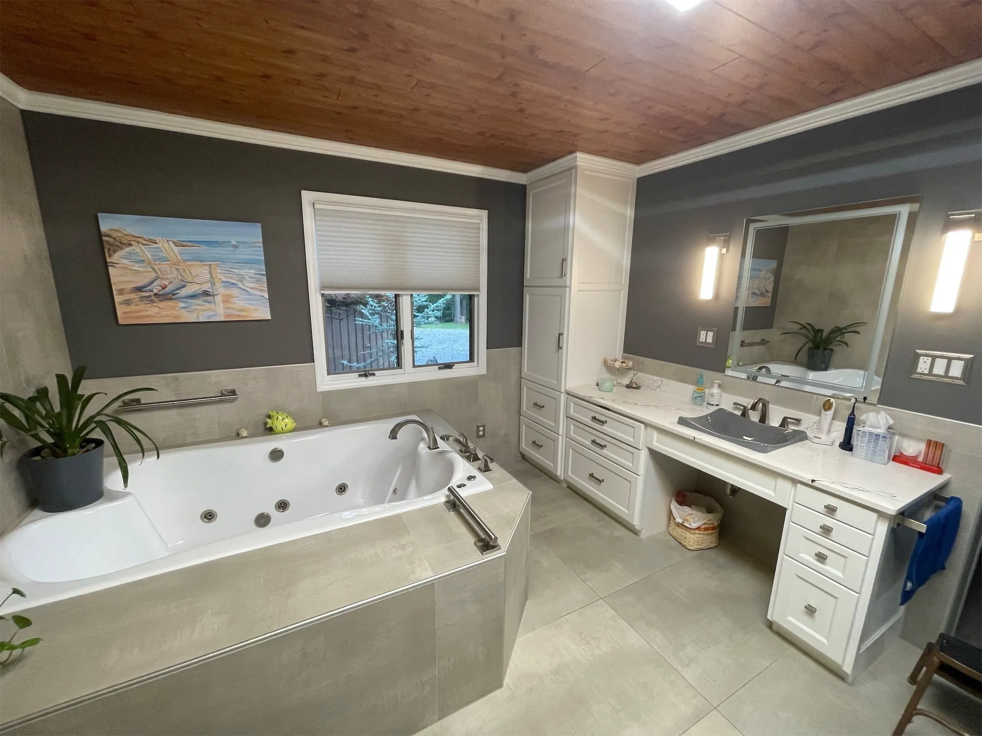 An image of a vanity, shower, and bathtub project in a bathroom completed by ProSource of Knoxville