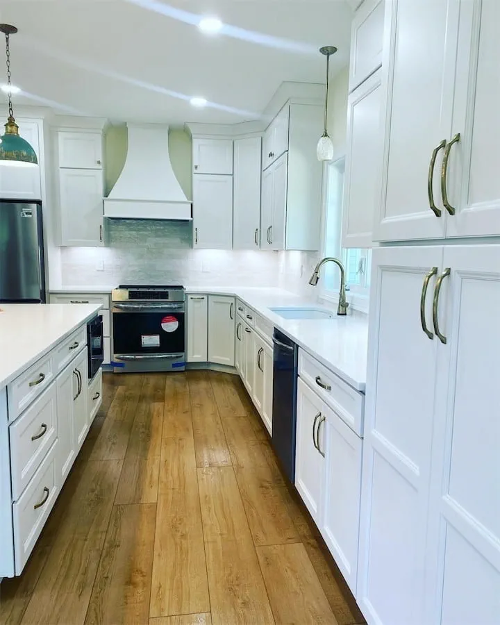 Remodeled kitchen with white cabinets