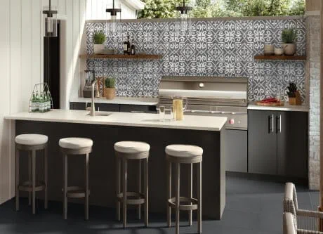 Patterned backsplash tile and solid countertop in outdoor kitchen
