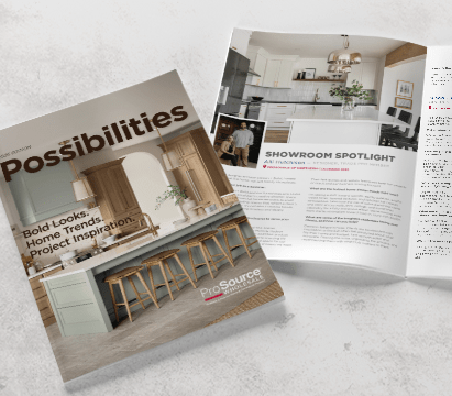 Open ProSource ‘Possibilities’ catalog highlighting a bright kitchen renovation with wood cabinetry, white countertops, and modern bar seating.