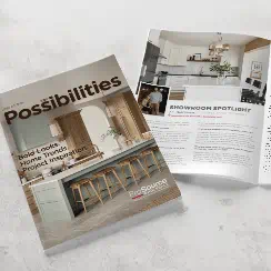 ProSource ‘Possibilities’ lookbook shown open on a tabletop, featuring a contemporary kitchen design with natural wood cabinetry and clean white accents.