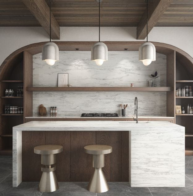 Modern kitchen interior with wooden shelves, marble countertops, pendant lights, and stylish stools.