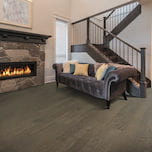 A remodeled living room with hardwood flooring