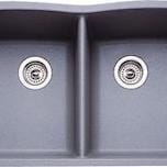 A kitchen sink with a dark grey finish