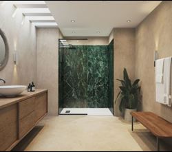 Modern bathroom with wooden vanity, green marble shower wall, and contemporary decor.
