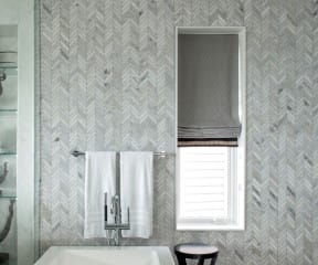 Bathroom with chevron wall tile