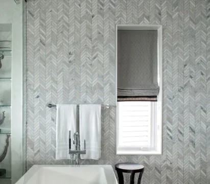 Bathroom with chevron wall tiles