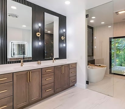 Bathroom remodel with black walls, wood cabinet vanity