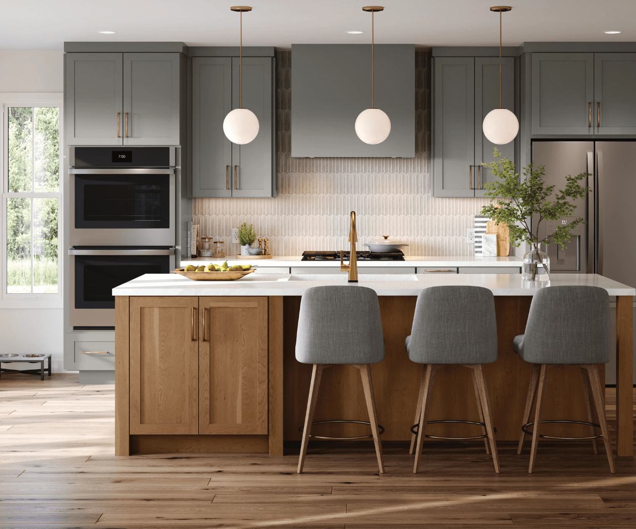 Modern kitchen with gray and wooden cabinetry, central island, pendant lights, and gray stools.