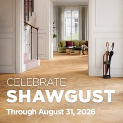 Elegant interior with wooden flooring, featuring promotional text for Celebrate Shawgust through August 31, 2026.