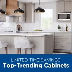 Modern kitchen with light gray cabinets, island counter, and promotional text 'LIMITED TIME SAVINGS Top-Trending Cabinets.'