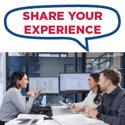 A group of individuals sit at a table with the text 'Share Your Experience' displayed above them.