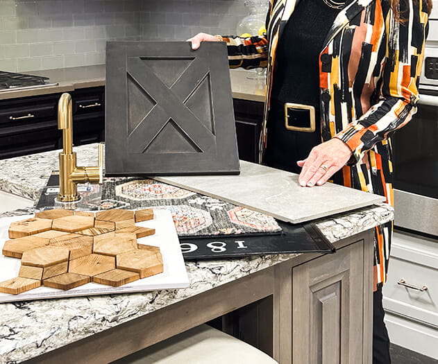 Designer with product samples laid out together