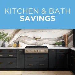 Modern kitchen with black cabinets, marble backsplash, brass hardware, and the text "Kitchen & Bath Savings" displayed above.
