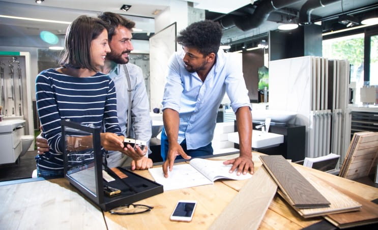 Homeowners meeting with their account manager in the showroom