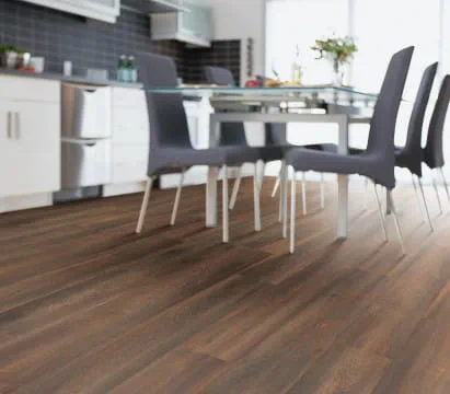 Dark toned laminate flooring in a kitchen