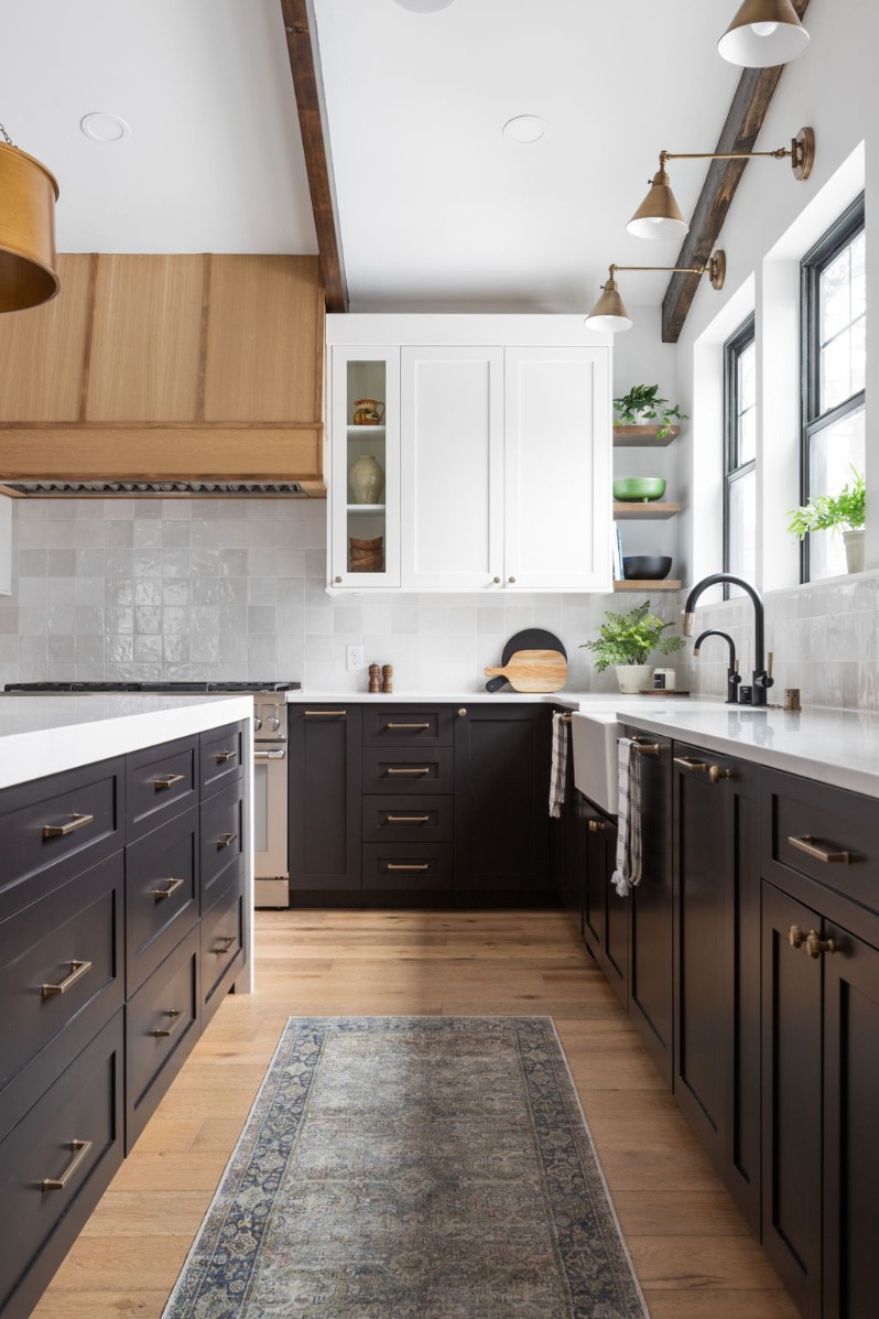 Black cabinets with gold hardware kitchen scene